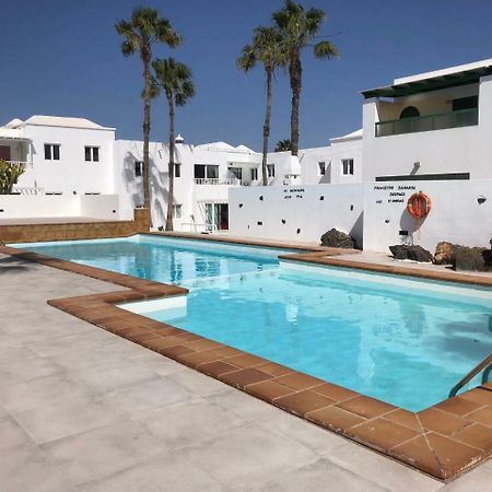 Апартаменты Sea Breeze With Shared Pool And Near The Beach Коста-Тегисе Экстерьер фото