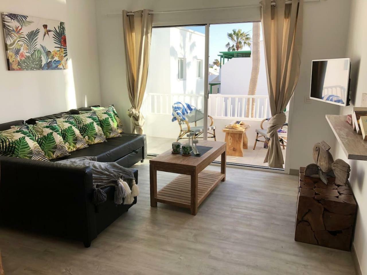 Апартаменты Sea Breeze With Shared Pool And Near The Beach Коста-Тегисе Экстерьер фото
