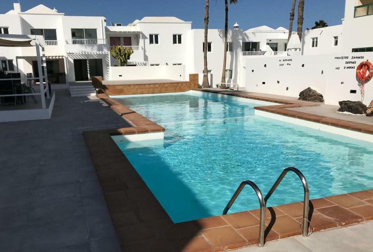 Апартаменты Sea Breeze With Shared Pool And Near The Beach Коста-Тегисе Экстерьер фото